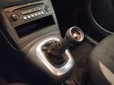 an image of a car dashboard with a gear stick