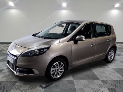 a picture of a silver car parked in a room