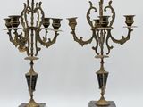 pair of antique brass candelabs on marble bases