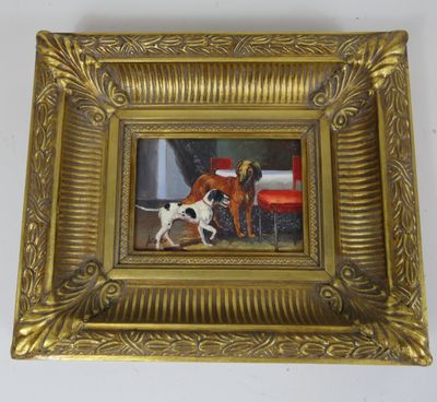painting of two dogs and a fire hydrant in a gold frame