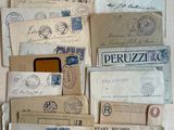 a lot of old letters and envelopes on the table