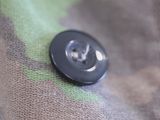 a close up of a button on a piece of fabric