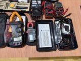 a lot of electronic equipment in a case on a table