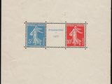 an old stamp with a picture of a man and a woman on it