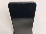 an image of a black cell phone on a stand