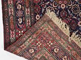 an image of a close up of a rug on a white surface