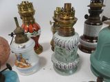 many different types of lamps on the table