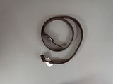 a brown leather strap with a silver clasp on it