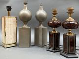five different lamps that are sitting on a table