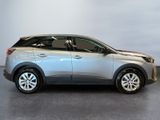 the silver car is parked in the garage on the concrete floor