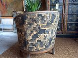 a potted plant sitting on a chair in a living room