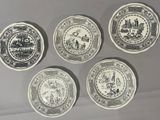 six black and white plates with different designs on them on a table