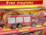 a toy fire truck with a crane on top of it