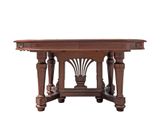 the table is made of wood and has a carved top