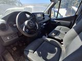 a view of the inside of a vehicle from the driver ' s seat