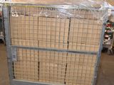 a large metal cart with a bunch of boxes on it