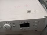 a white washer and dryer sitting next to each other