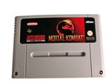 a game boy ' s nintendo game with a mortal combat sticker on it
