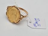 an image of a gold coin ring with a price tag attached to it