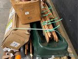 a pile of boxes and other items on a pallet