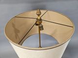 a lamp that is sitting on a table with a light on it