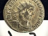 l'image d'une pièce de monnaie sur laquelle figure l'image d'un homme