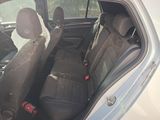a car that has two seats in the back of it