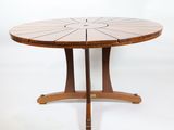 an image of a wooden table with a circular design on it