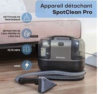 an image of a black and silver vacuum cleaner on a wooden floor