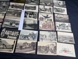 a lot of old black and white pictures on the table