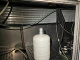 an image of a white jug of water in a refrigerator