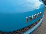 a close up of a blue car with the word iveco on it