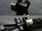 two cables connected to each other on a black surface