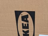 the box is full of items that are sitting on the floor