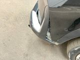 a close up of a car that has a dent in it