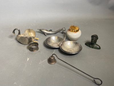a lot of silver items that are on the table
