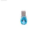 a close up of a pair of earrings with a blue topaz stone