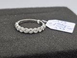 an image of a diamond ring with a price tag on top of it