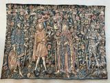 une image représentant une tapisserie sur laquelle figure un groupe de personnes