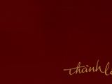 a picture of a red book with gold writing on it