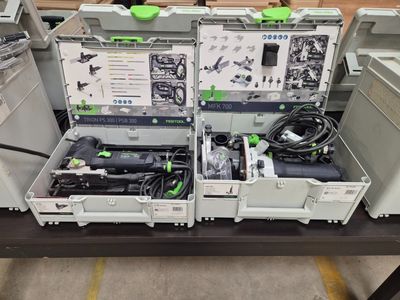 many different types of electronic equipment on a table