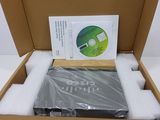a box with a cd inside of it on a white surface