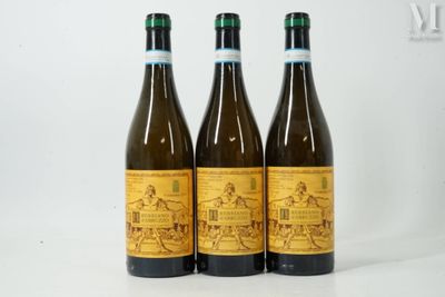 three bottles of wine sitting next to each other on a table