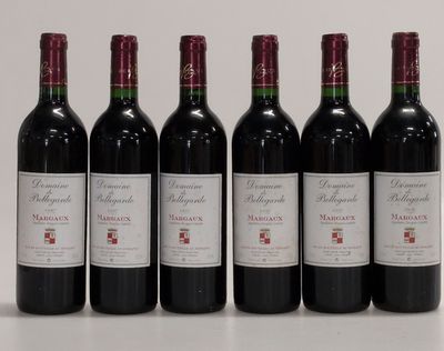 six bottles of red wine lined up in a row on a table