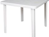 the table is white and has a white top and legs