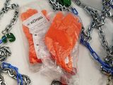 a bag of carrots on a chain on a table