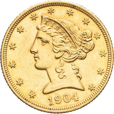 gros plan d'une pièce de monnaie sur laquelle figure une tête de femme