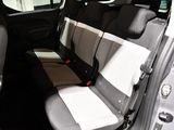 the back seats of a car are empty in the dark