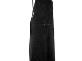 an image of a black apron hanging on a white wall