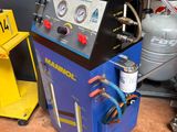 a machine that is sitting on the floor next to other equipment